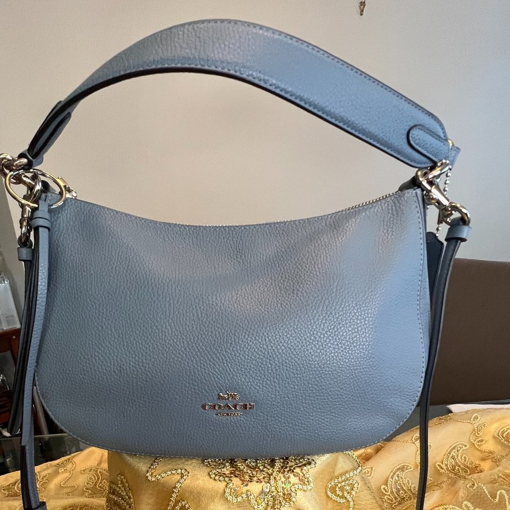 Coach like new leather light blue purse.